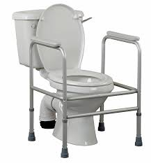Adjustable height toilet surround